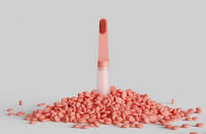 Toothpaste-Dispensing Toothbrushes